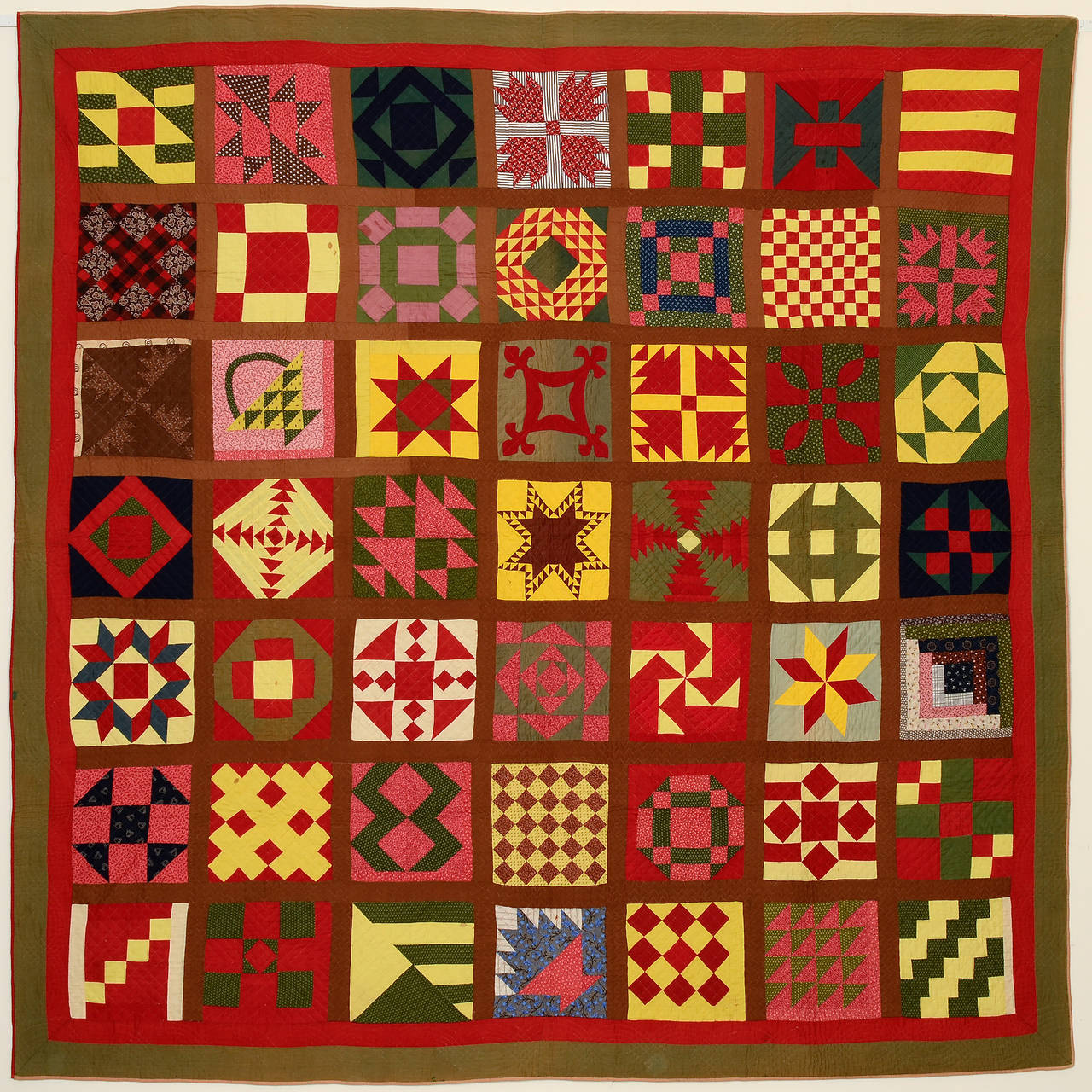 This bold sampler quilt is one of Lebanon County's best. The solid colors are typical of its Old Order Mennonite origin. There is slight fading but they are still very bold and vibrant. The patterns are a combination of traditional and original