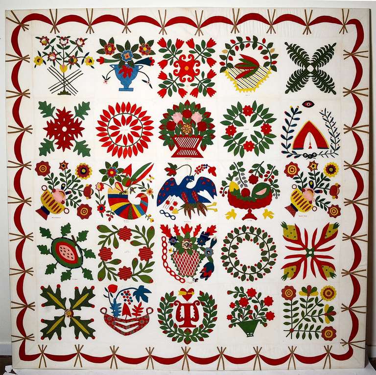 Outstanding Baltimore Album quilt that combines both traditional and whimsical, original blocks. The eagle  draws the eye to the center and then allows it to meander through the variety of finely detailed blocks. Signatures indicate the quilt was