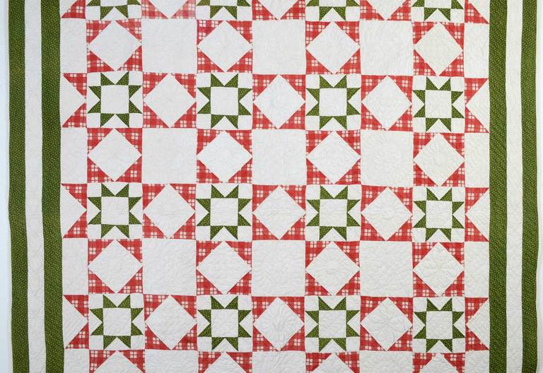 This Evening Stars Quilt is a lovely variation of a traditional pattern. Placing one star within another and placing the red stars abutting one another creates a variety of optical illusions and additional patterns. The quilt is from Gettysburg,