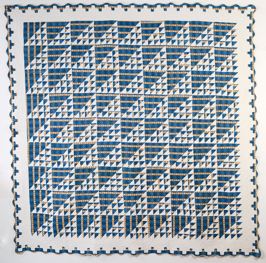 This elegant Birds in the Air Quilt is one of the finest examples I have seen. The fabric is beautiful and most unusual. The quilting is excellent with a lovely meandering vine throughout the white border. The pieced blue border is a treatment