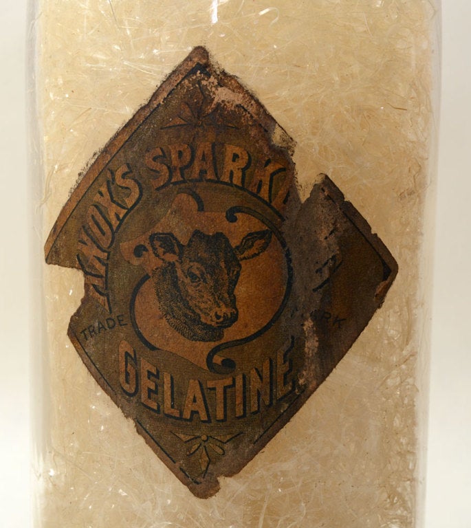 These five country store bottles are appealing for their history as well as their shapes. The bottles contain their original merchandise. Two, with labels, contain Knox Sparkling Gelatin. The others have seeds, grains and beans. They range in height