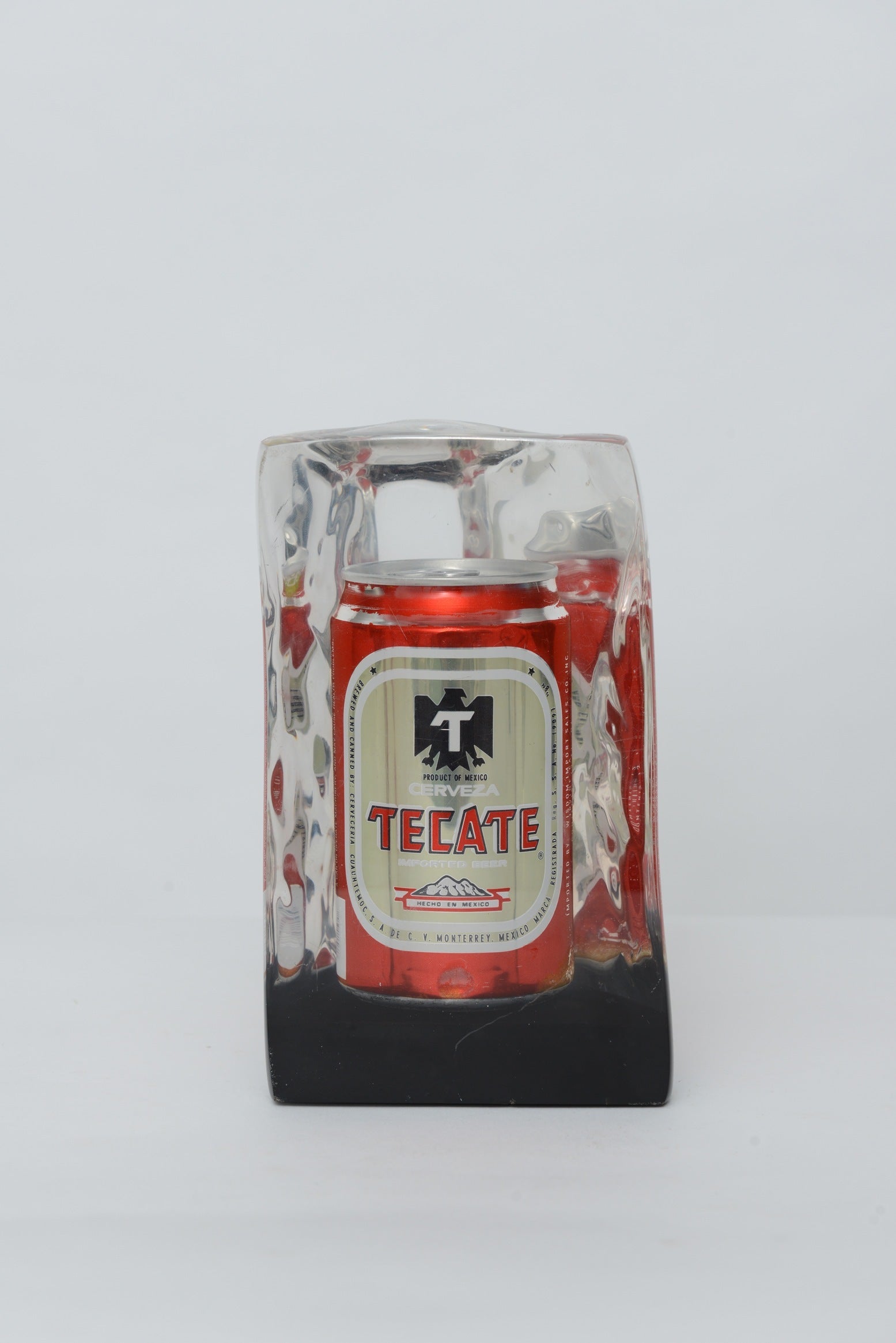 Tabletop Sculpture of Molten Lucite Encasing "Tecate" Beer Can