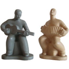 Pair of Handsome Musician Ceramic Sculptures signed by Kling 
