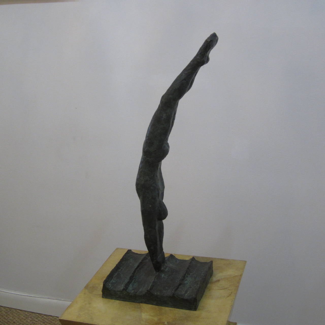 Bronze sculpture of diver signed and dated by Martin Silverman, New York. Wonderful texture and patina.