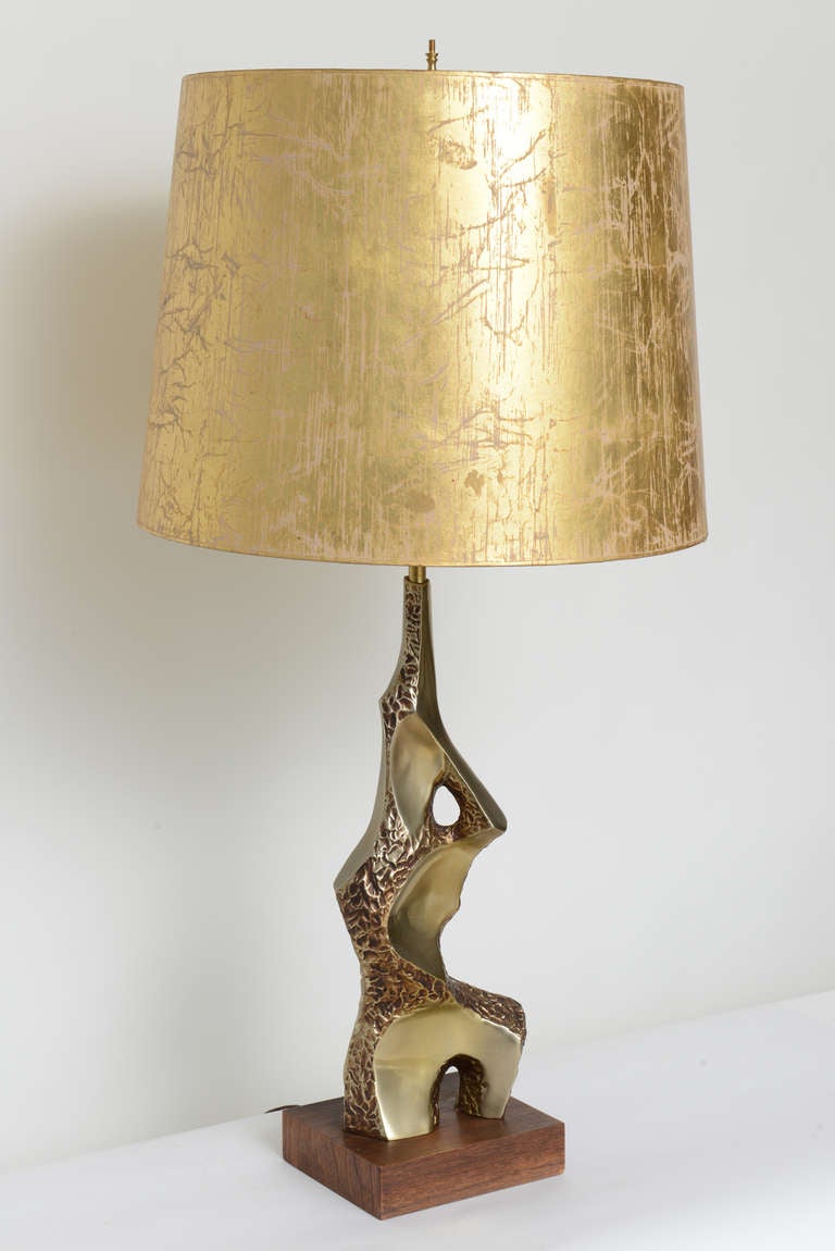 Brutalist brass torso lamp mounted on original wood base designed by Maurizio Tempestini for Laurel lighting. Shade is for display purposes only.