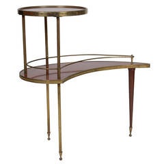 French Curvaceous Double Tiered Brass, Laminate, and Wood Side Table