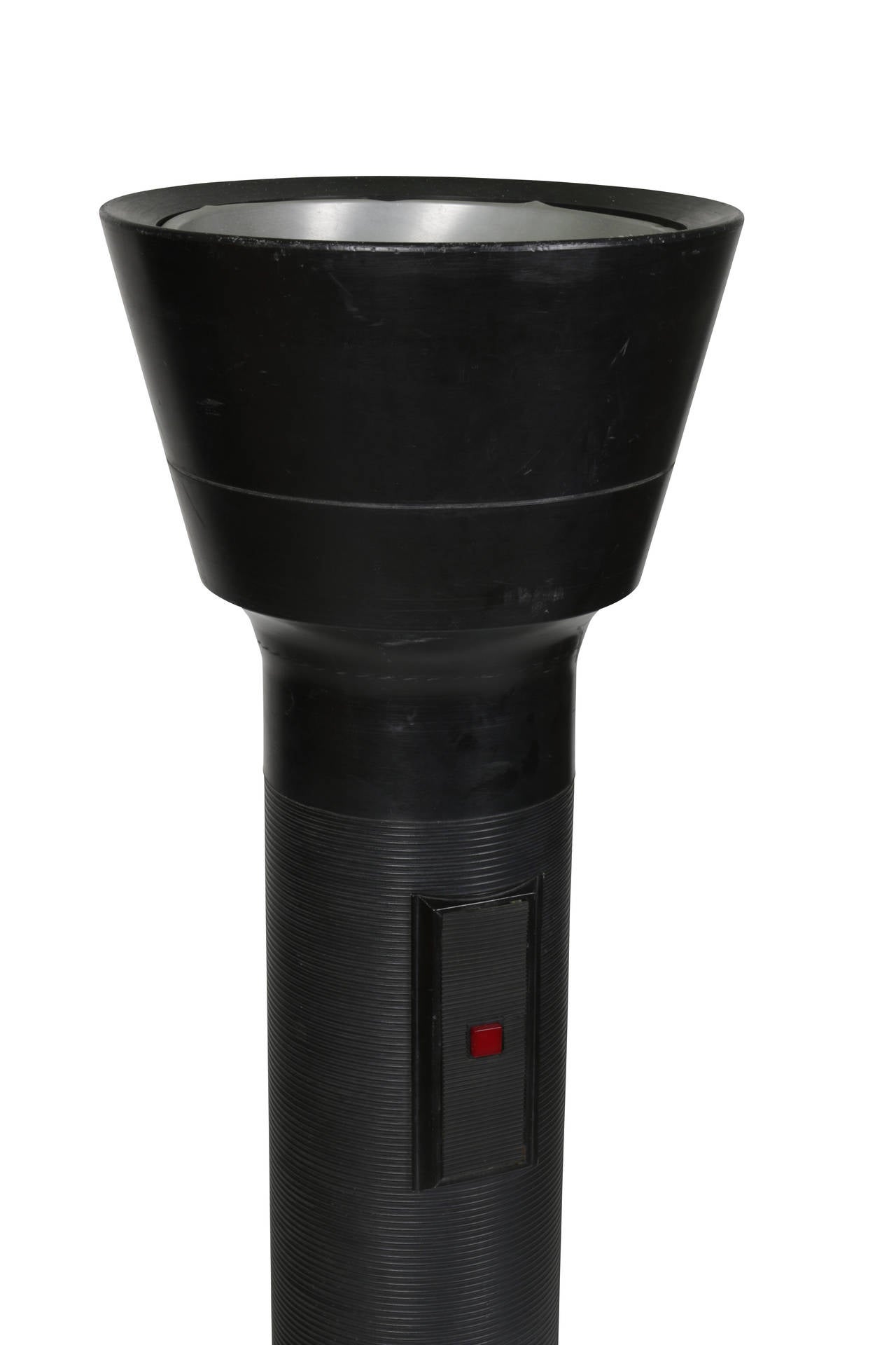 Flashlight floor lamp standing approximately 5 feet tall and has typical flashlight glider on/off switch.