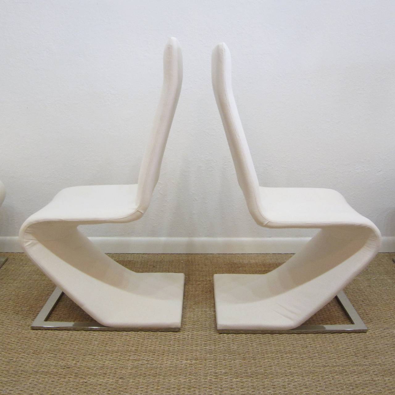 Polished Original Cantilevered Chairs with Steel Bases by Roger Rougier  For Sale