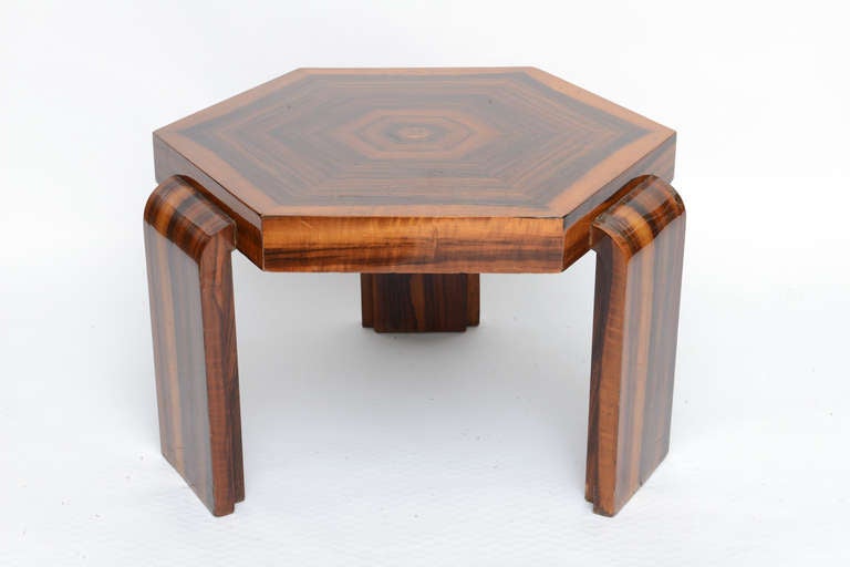 Wood six sided side table with three waterfall legs. Fabulous grain and patination.