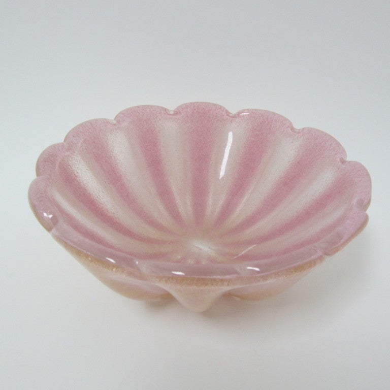 Pink efesco ribbed bowl filled with aventurine; hand blown on the Isle of Murano by Ercole Barovier.