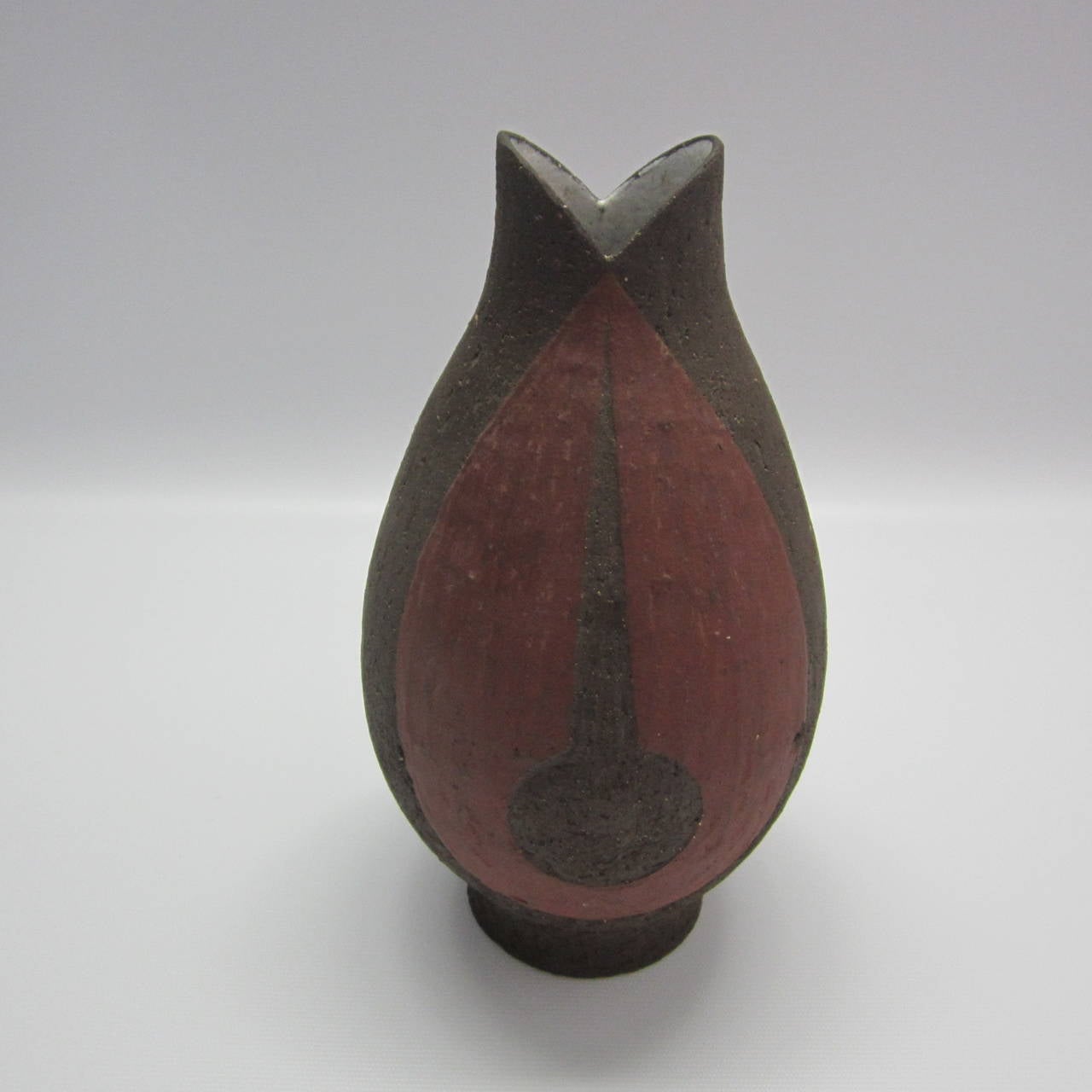 One of a kind Danish stoneware vase with rough texture two-tone exterior and raw-glaze interior. Stamped and marked.