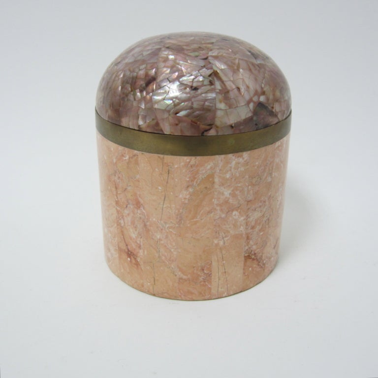 Elegant tessellated pink marble canister with brass ring at the top and capped with a curved tessellated mother-of-pearl lid. Lovely functional tabletop catch-all, great for a gift, even to yourself.