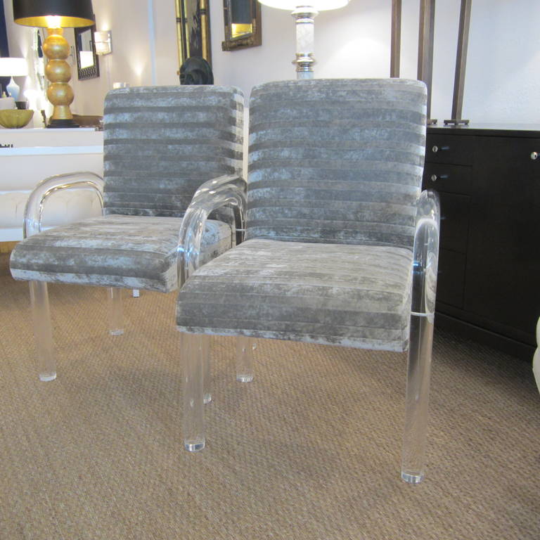 Lovely pair of solid tubular lucite chairs with grey on grey cotton velvet blend upholstery.