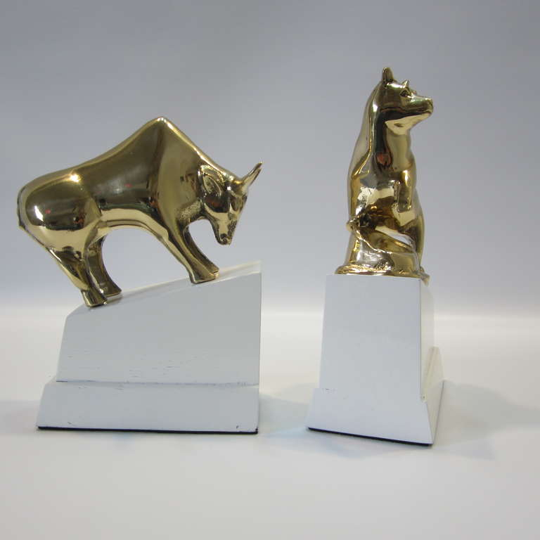 Mid-20th Century Polished Brass Bull and Bear Bookends on Lacquered Blocks For Sale