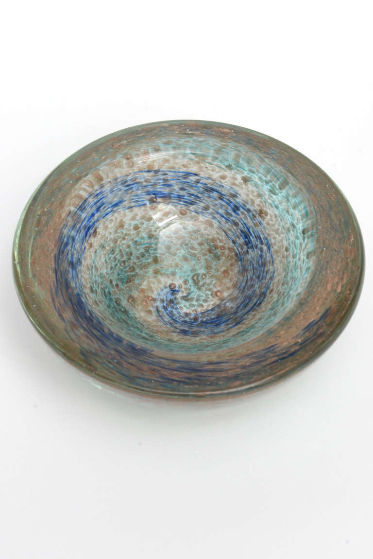 Handblown Murano glass geode bowl with a wonderful blue and green swirl pattern filled with golf leaf flecking. Heavy thick glass with soft edges.
        