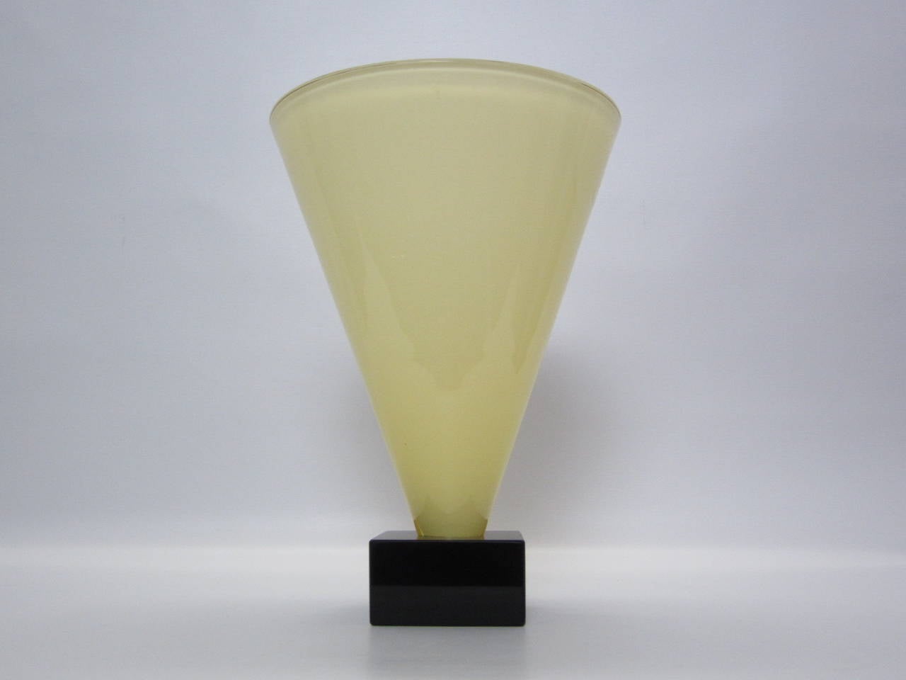 Fantastic handblown Murano glass cone shaped vase with attached black glass square block base showing etched signature A.V. Mazzega-Murano.