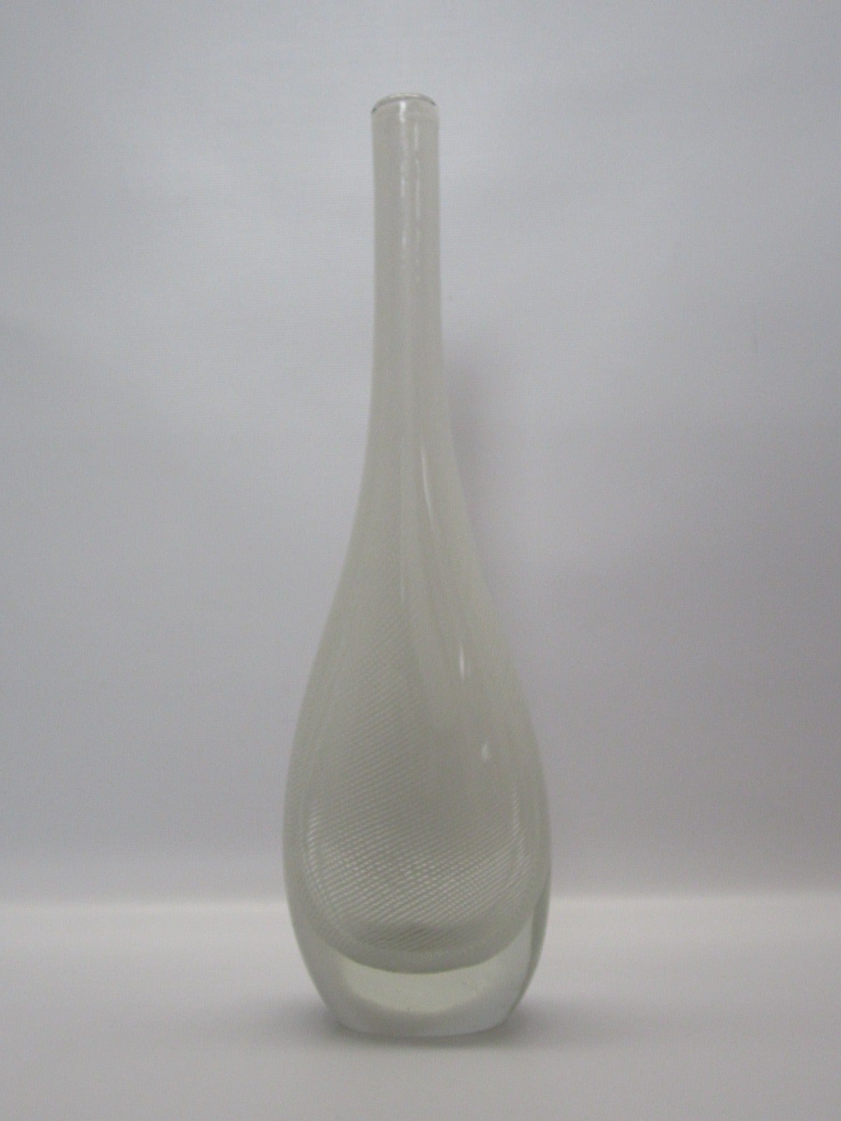 Stunning handblown Murano glass vase with white swirl internal stripes. Original sticker remains on bottom.