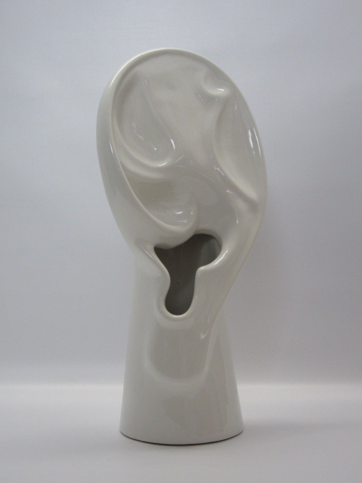 Porcelain vase by Raymor in the shape of an ear. Original sticker on bottom.