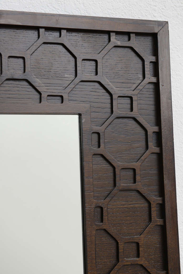 Well made oak framed mirror with chic continuos fretwork detail. The back is solid and has built in hooks for both vertical and horizontal mounting.

NOTE: PLEASE FEEL FREE TO CONTACT OUR GALLERIES DIRECTLY FOR ADDITIONAL INFORMATION & PRICING.