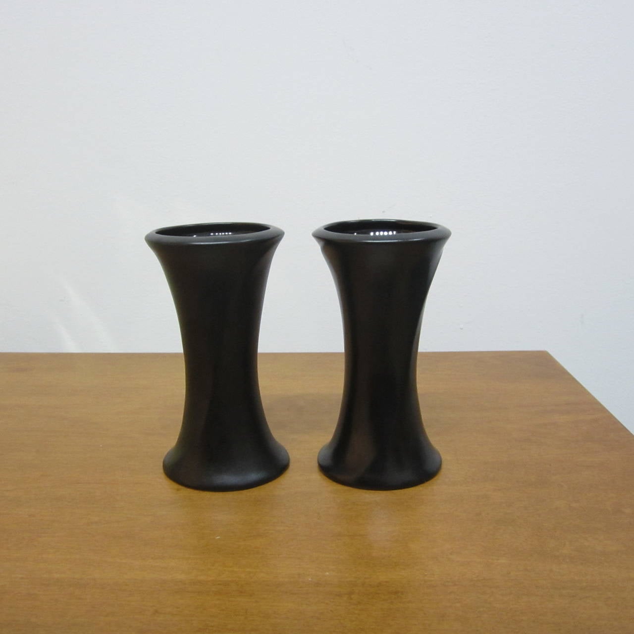 Pair of matte black ceramic vases designed by Elsa Peretti for Tiffany & Co made in Italy. Sold as a pair.