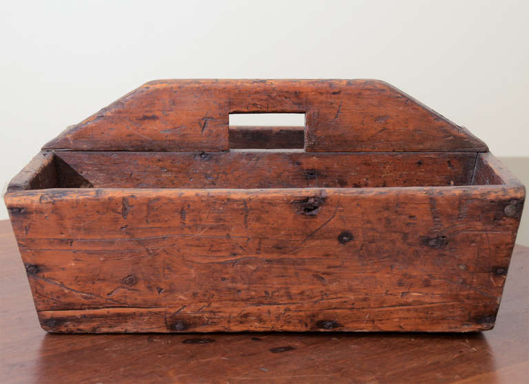 Early american oak caddy with handle and small compartment on one side. Wood has excellent patina.