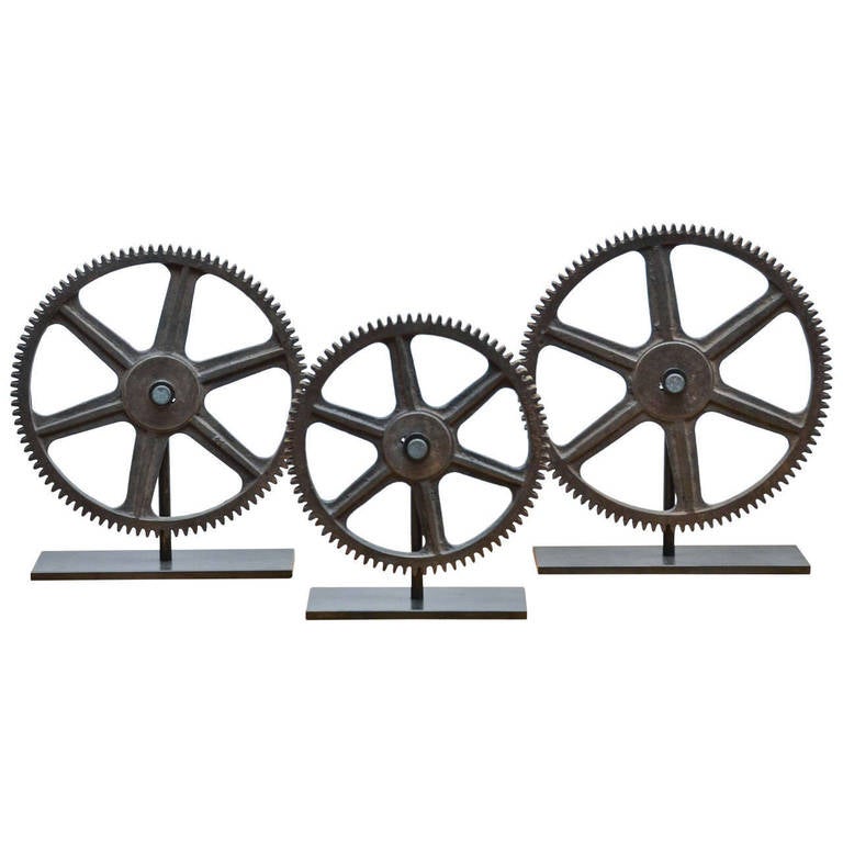 Collection of Soild Bronze Gears on Metal Display Stands