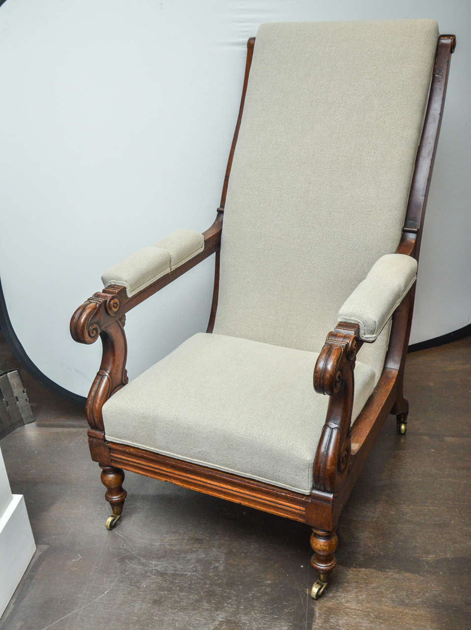 19th Century Antique Mahogany William IV Period Armchair

Sturdy mahogany frame, beautiful hand-carved details, and brass casters. 

This armchair has been newly reupholstered in a neutral beige linen fabric. 
