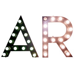 Painted Tin Letters Rewired With Bulbs Used for a Theater Sign