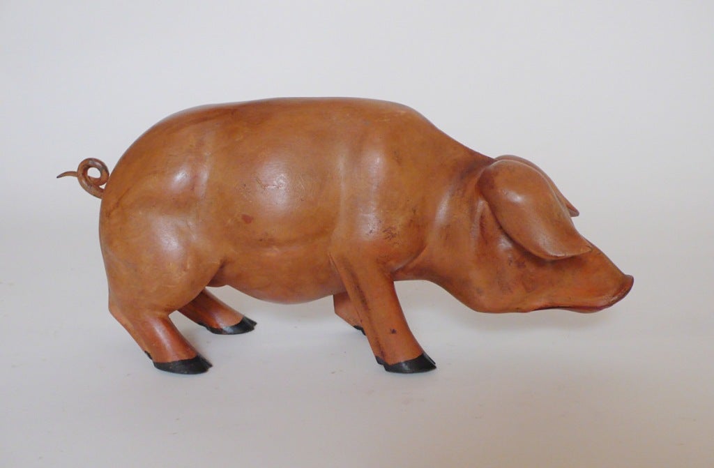 wooden pig sculpture