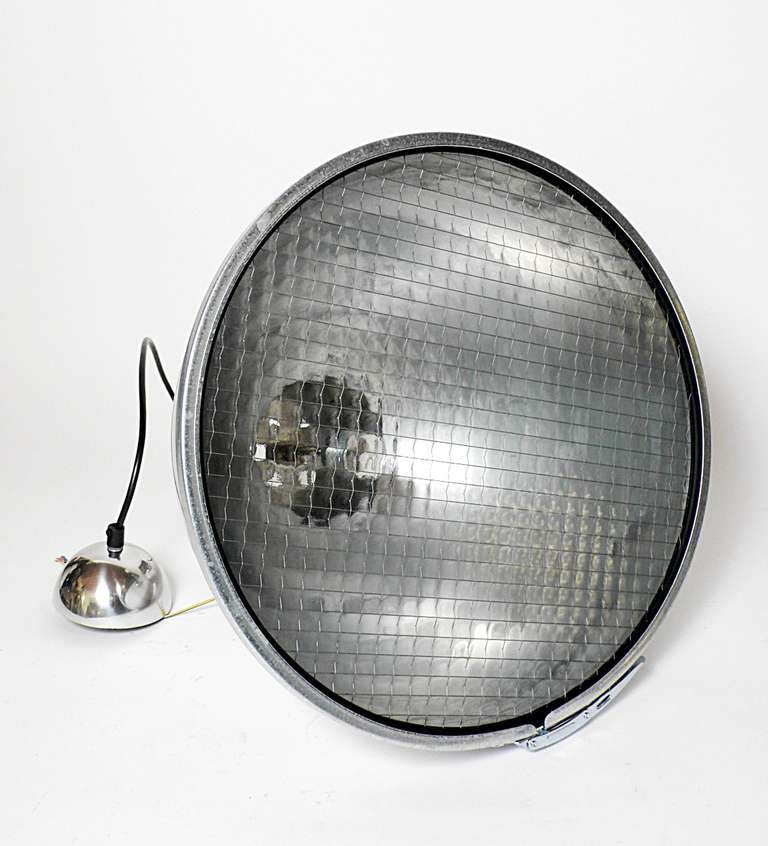 Mid-20th Century Industrial Swinging Stainless Steel Lights With Wired Glass.