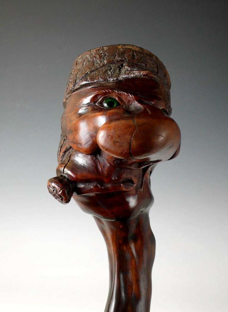 Fruitwood A Carved And Stained Wood Walking Stick.