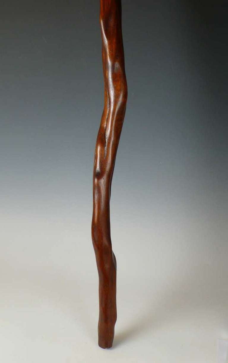 A Carved And Stained Wood Walking Stick. 2
