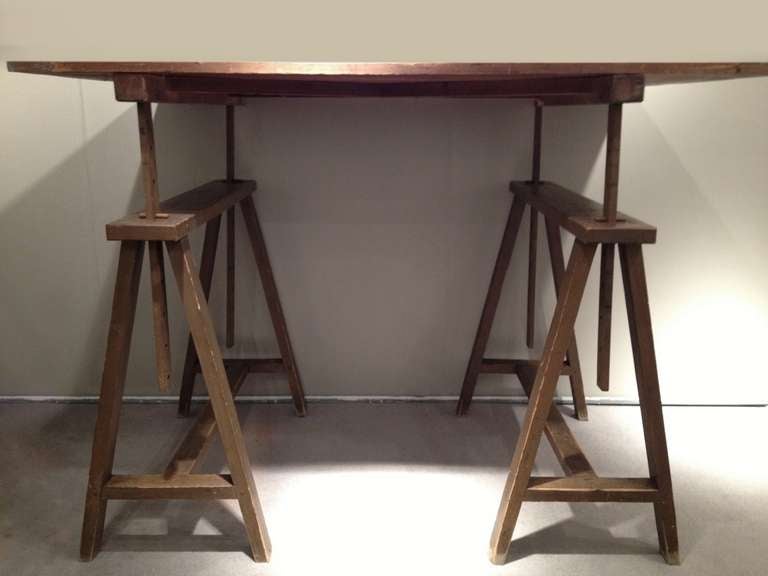 Unusual early XX Century Italian wooden drafting machine trestle table. The board can be liftable and reclining.