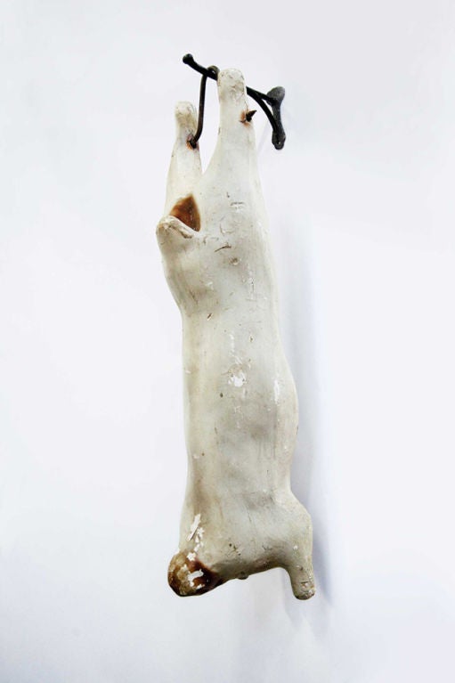 A pair of pigs butcher shop signs