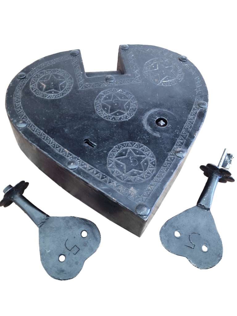 A locksmith trade sign, depicting a big painted iron padlock, heart shape, black color.The secure bar could be locked over a metal bar. 2 keys. Left one secure the bar, right one, slite the bar it self. The back is flat and plein. 
