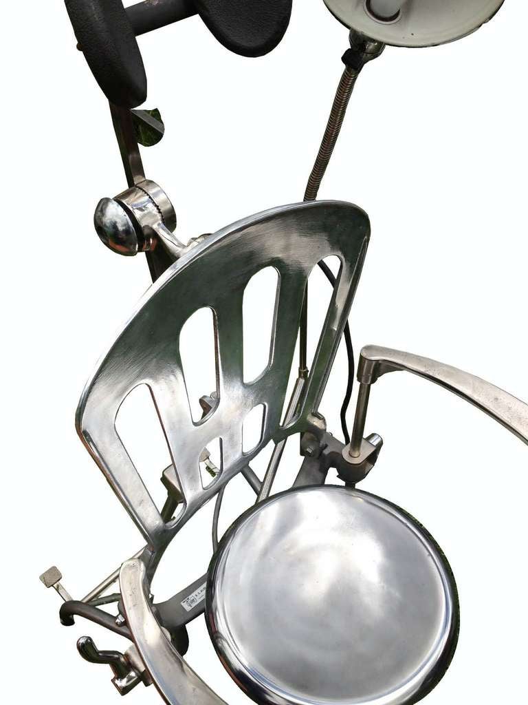 A Rare and Unusual Iron and Stainless Steel Dentist Armchair with Lamp In Excellent Condition In Milan, IT