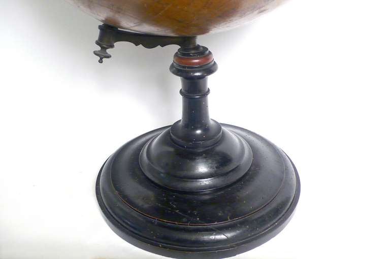 19th Century 18 Inches Italian papier machè terrestrial globe with wooden base.
