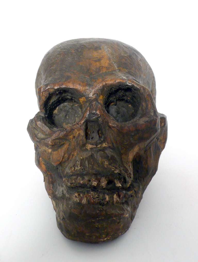 An important and rare Italian Wunderkammer Memento Mori sculpture, depicting a wooden skull.