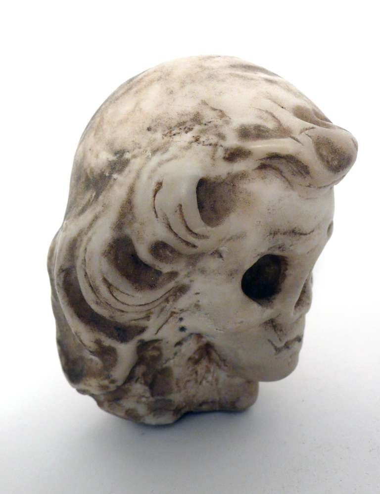 An important and rare Italian Memento Mori sculpture, made out of white Carrara marble, depicting a Vanitas of a child.