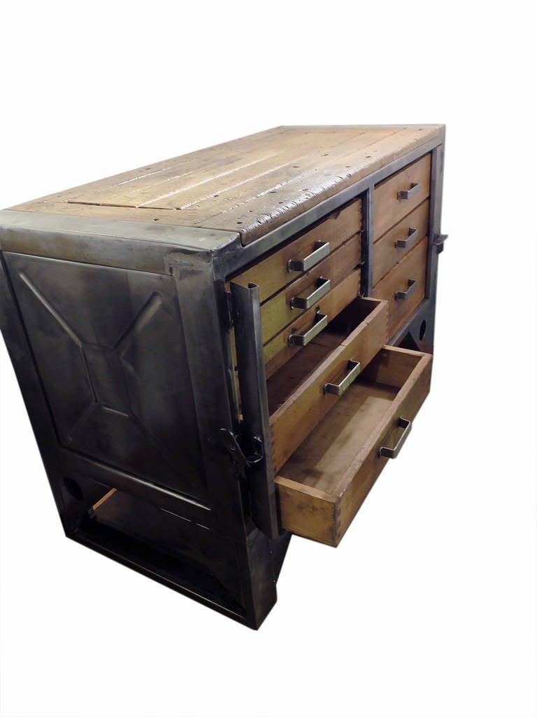Two Italian industrial chests of drawers made out of wood and iron. 