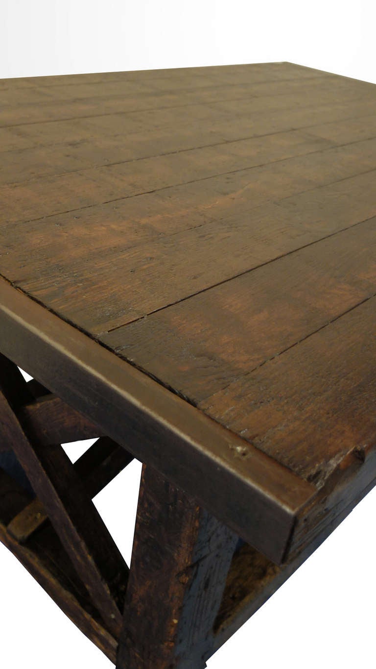 A beautiful carpenter's wooden workbench, perfect for a kitchen island table. Original patina.