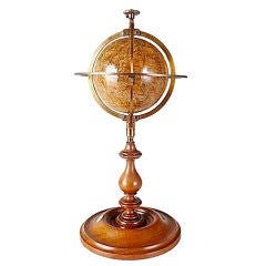 A rare miniature Delamarche terrestrial globe. 11