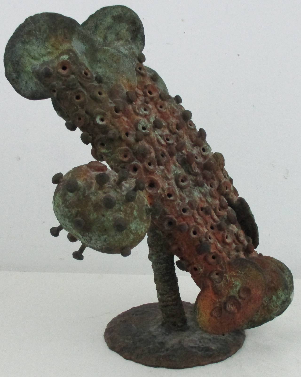 Impressively scaled Ihlenfeld bronze with an exceptional patina in his signature abstracted plant form motif. believed to be from the jungle plant series, unsigned