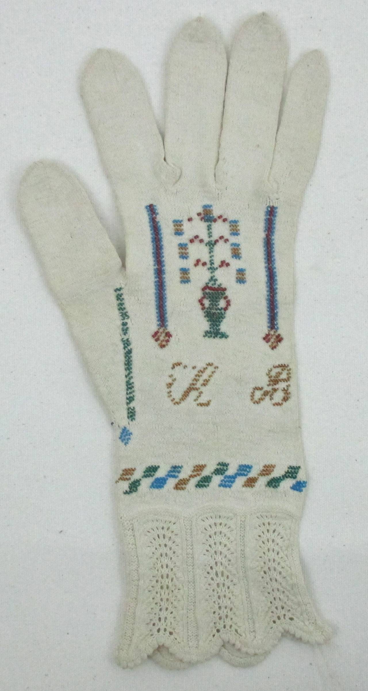 Very good condition knitted cotton glove with the date 1837 in glass beads on the palm and a tree and initials on the back hand and knitted pattern lace on the wrist. This glove is very similar to a pair in the Boston Museum of Fine Arts, Elizabeth