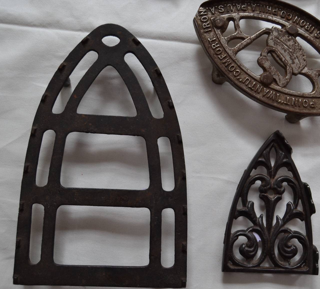 Ten Sad Iron Trivets For Sale 1