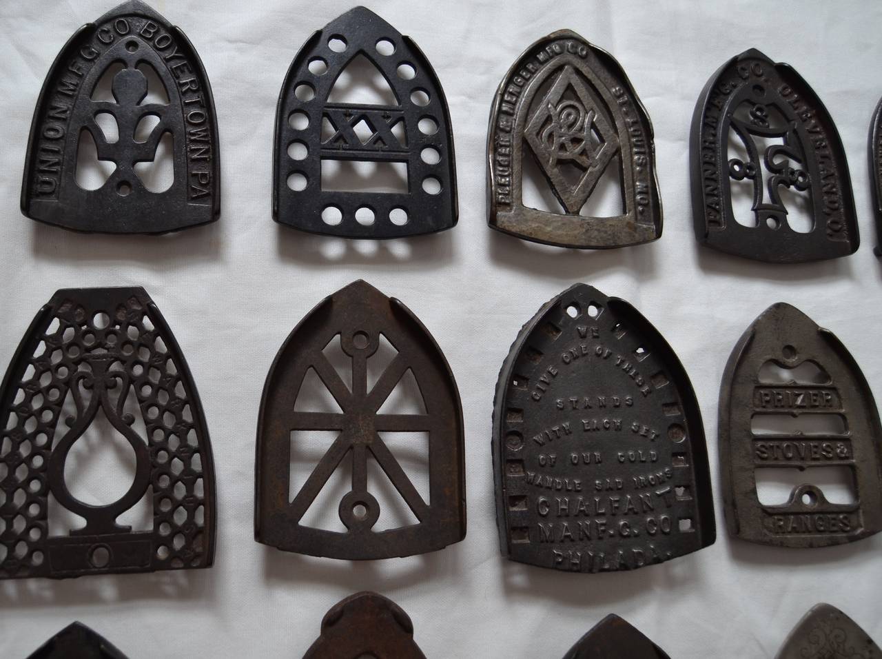 19th Century Collection of Sad Iron Trivets For Sale