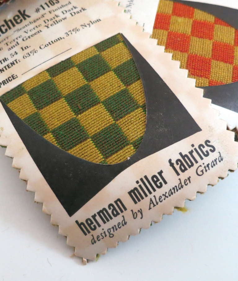 Over 500 swatches of fabric designed by Alexander Girard for Herman Miller, includes woven upholstery, printed upholstery, printed drapery and casement fabrics. all are laid down on heavy paper with display cut outs and have details of title, width,