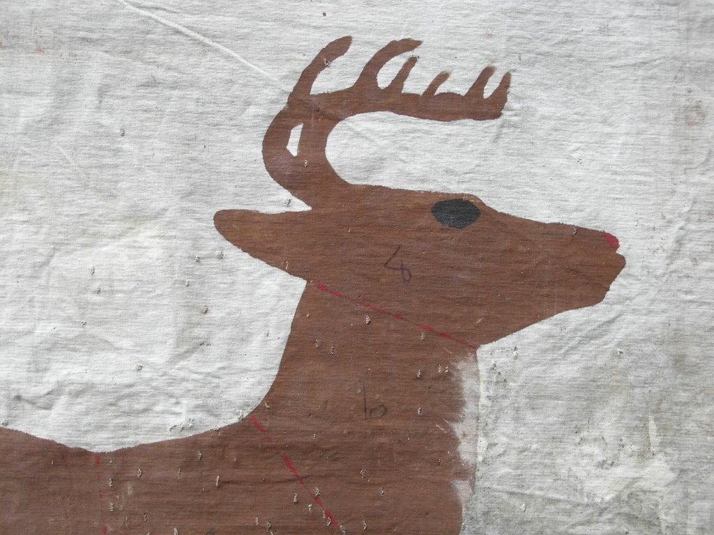 Silhouetted, bold, graphic image of a leaping stag, numbered sections designating desirable targets. 
attached to pine slat