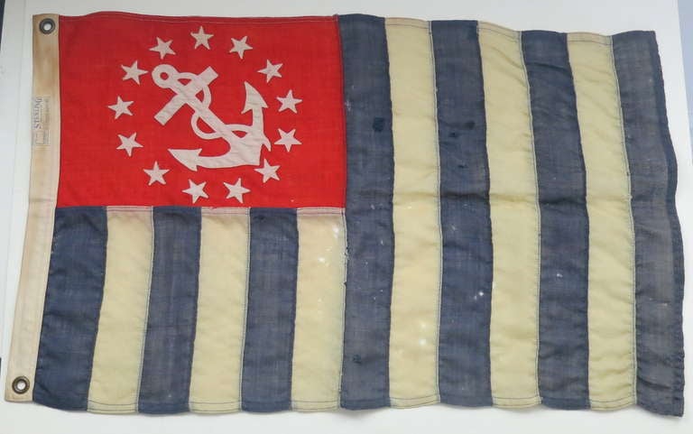 United States Power Squadrons Ensign from the 1930's, loss to wool and some foxing, sewn repairs in blue 