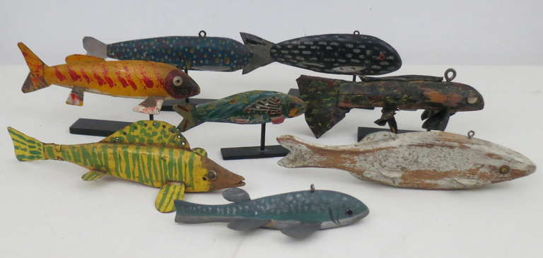 A collection of eight fish decoys ranging in length from 8.5 to 4.5 inches.
dates range from the 1940's to the 1960's. ex. Barbara Johnson Collection.
5 are on museum quality mounts.
